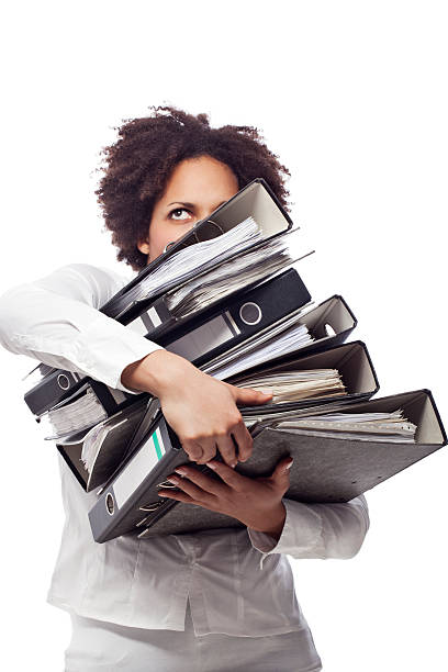 business womand carrying heavy file documents - studio psichè